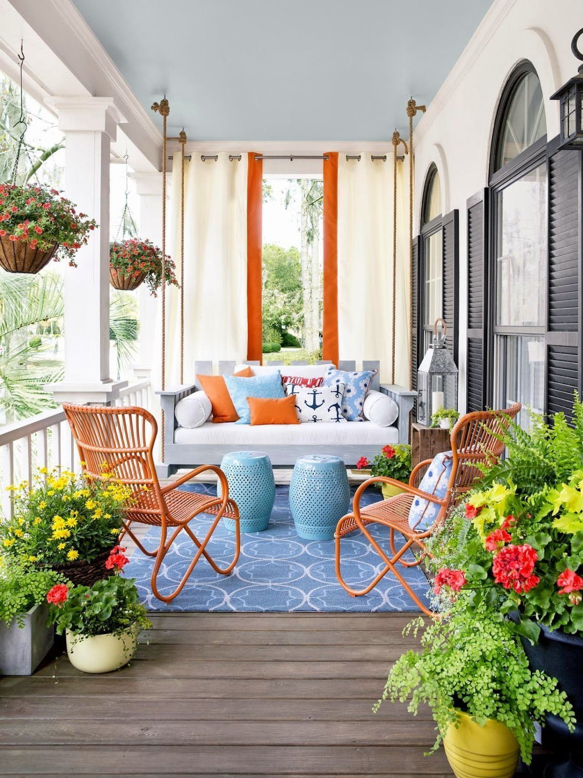 This Setting Combines Potted Plants with Rustic Furnishings to Create an “Outdoor” Living Room