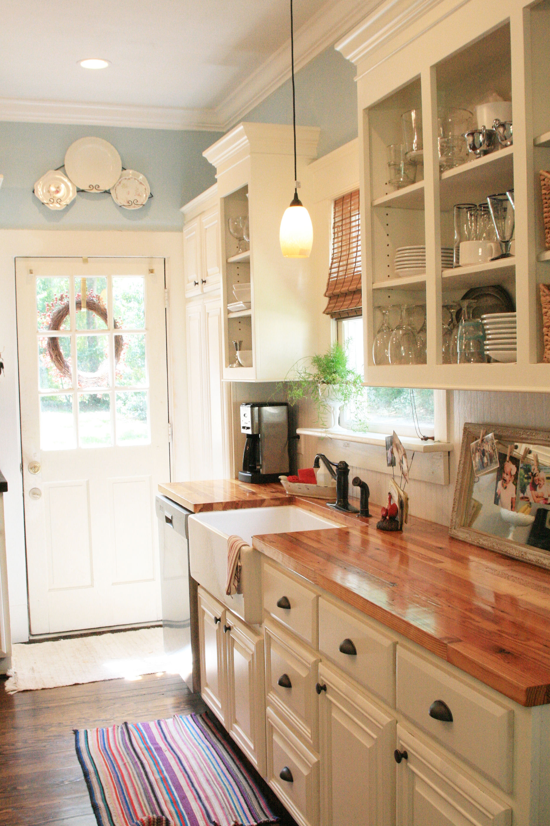 Wood Counters Add Warmth to a Clean White Kitchen