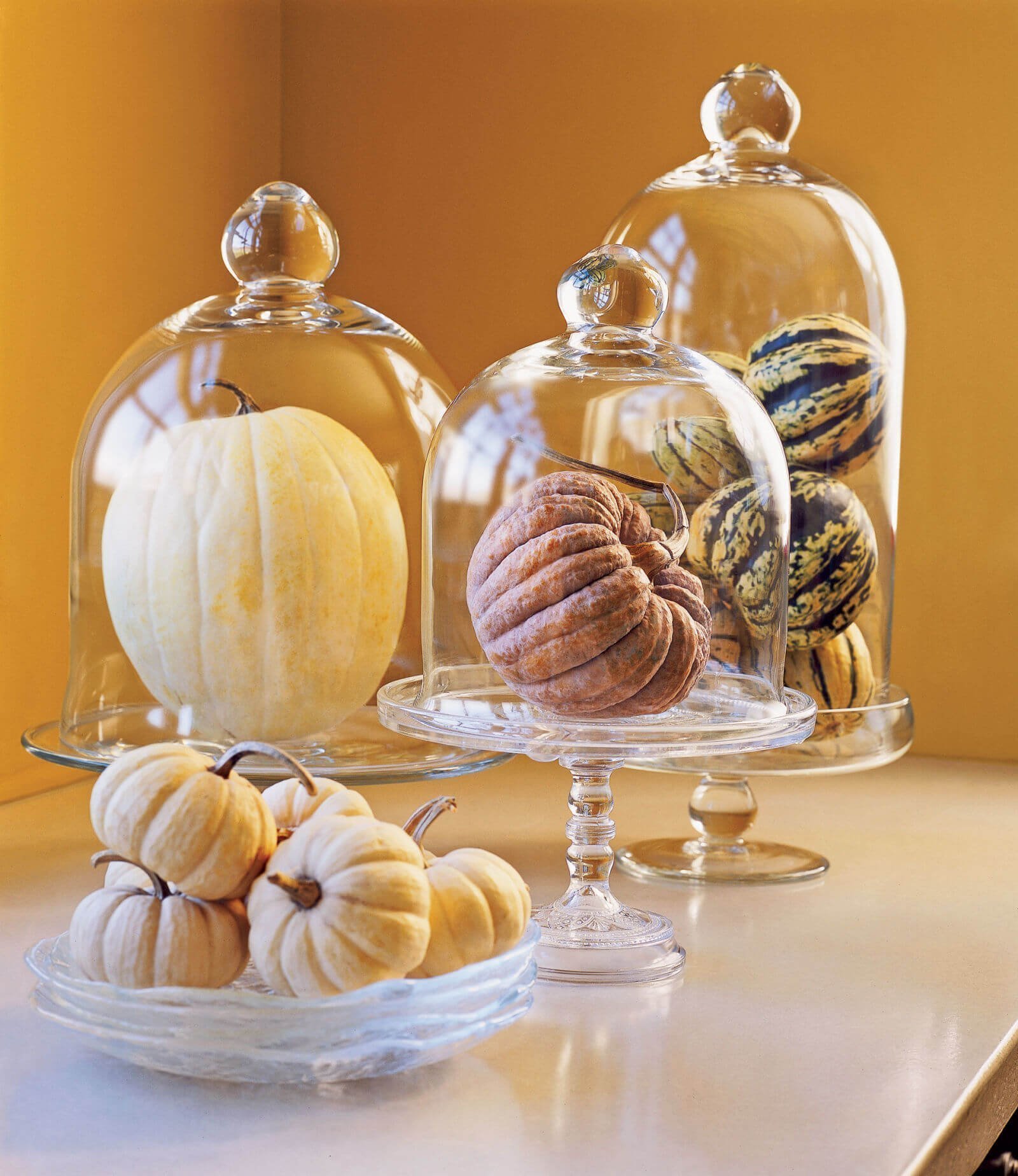 DIY Fall Centerpieces Idea: Pinecone and Pumpkin Apothecary Jar Centerpiece