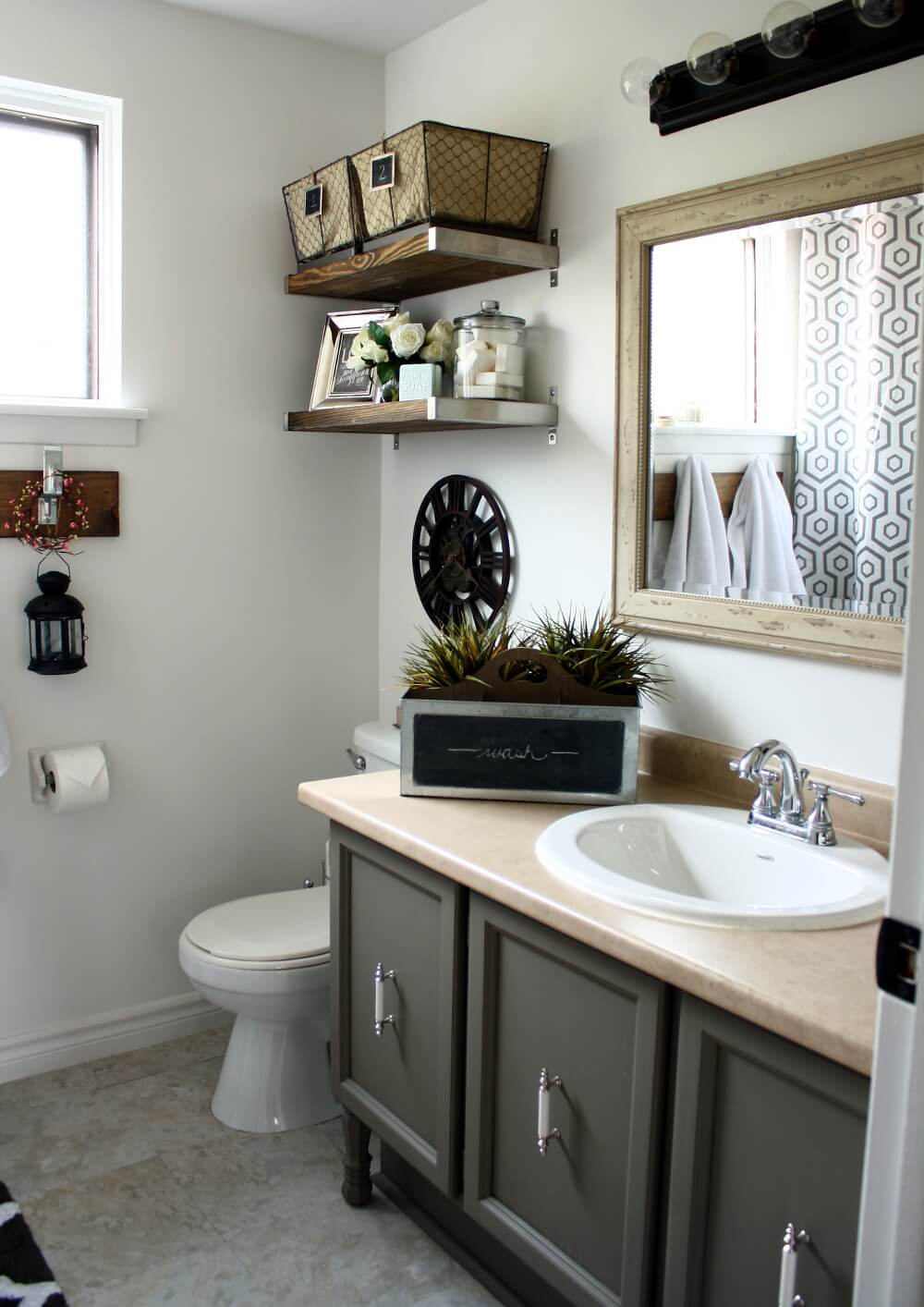 Industrial Chic Updates to Dated Fixtures for Small Bathroom by Interior Designer