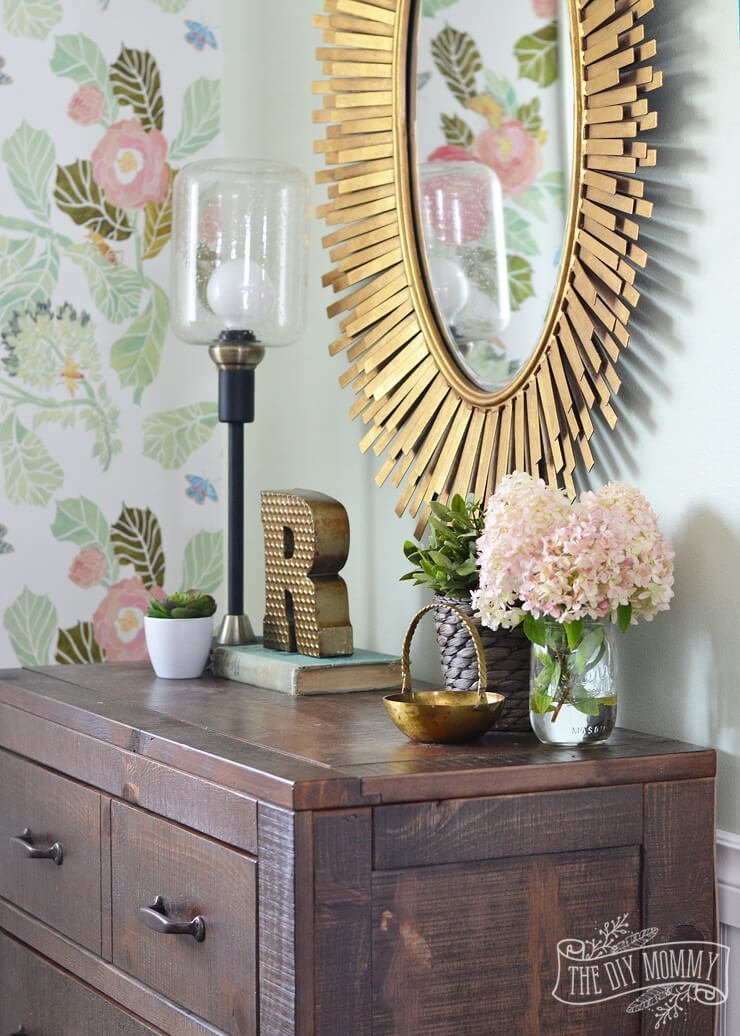 Flashy Decor on a Subtle Wood Dresser