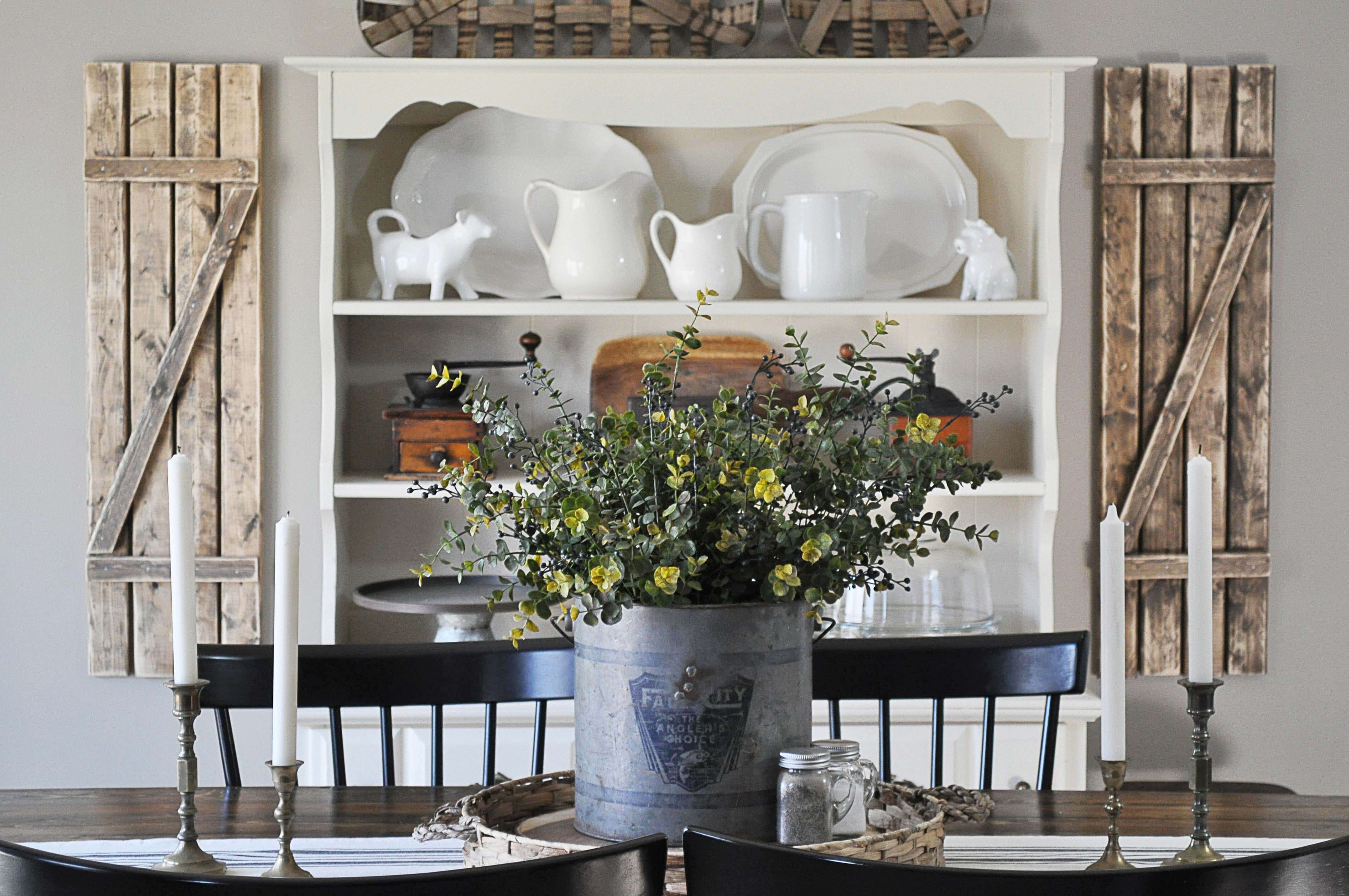 A Floral Centerpiece with an Old Farmhouse Backdrop