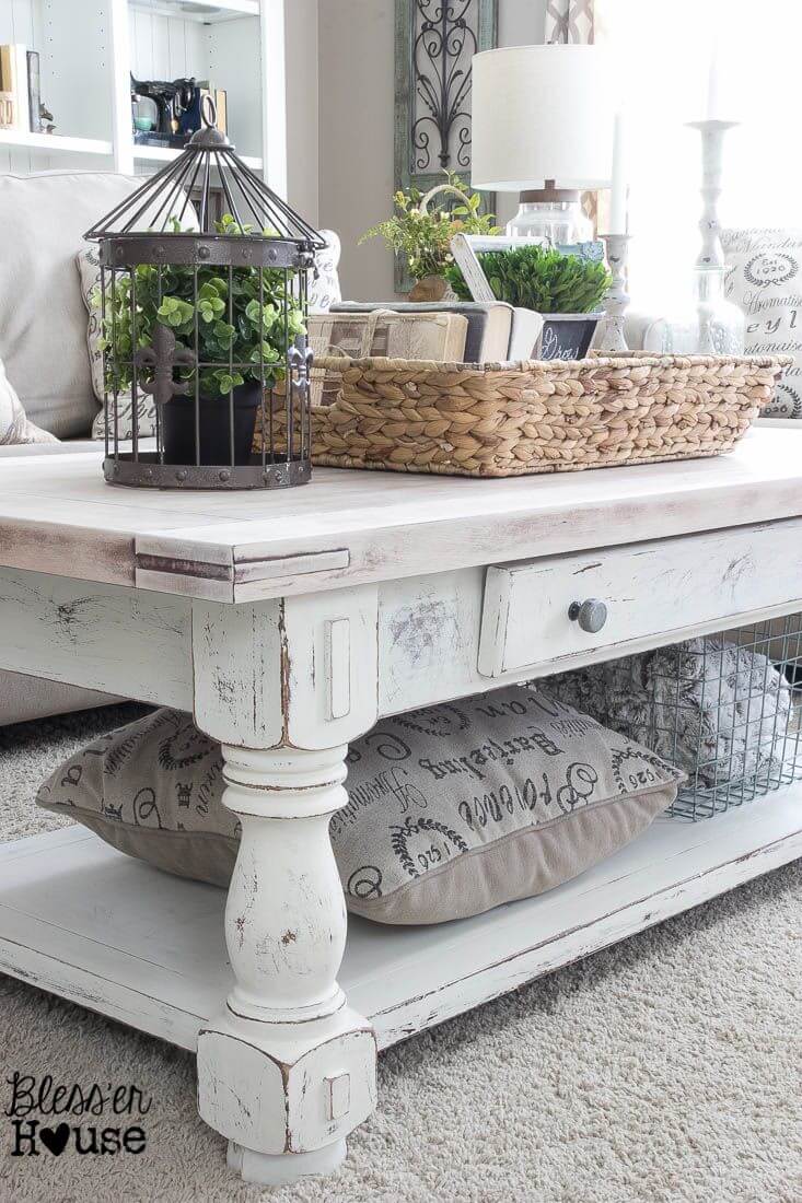 Earthy White-washed Table and Clutter-catching Raffia Basket