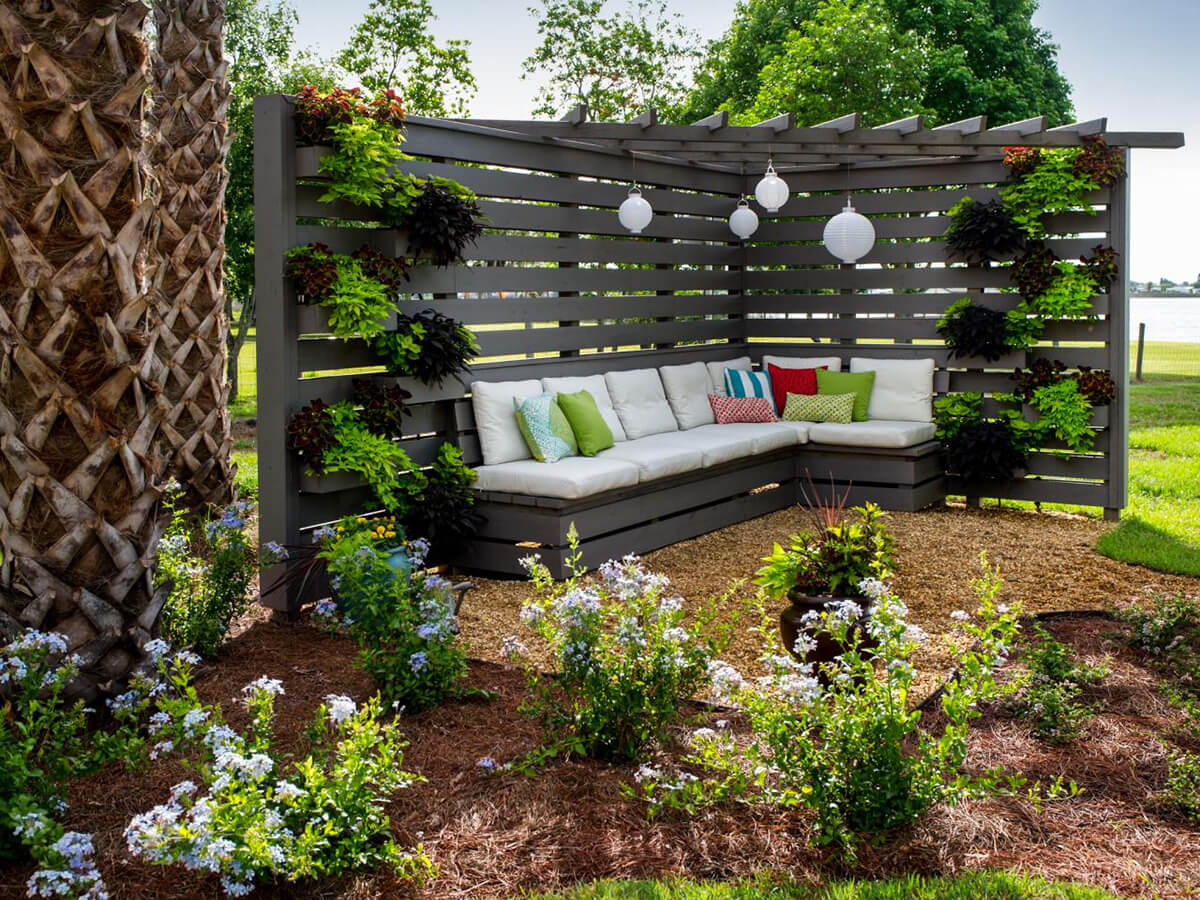 Corner Retreat Pergola With Suspended Lamps