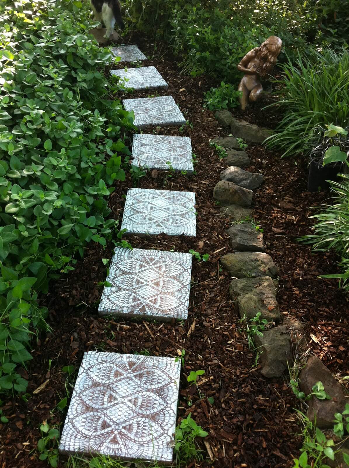 Show Off Custom Tiles Against Dark Mulch