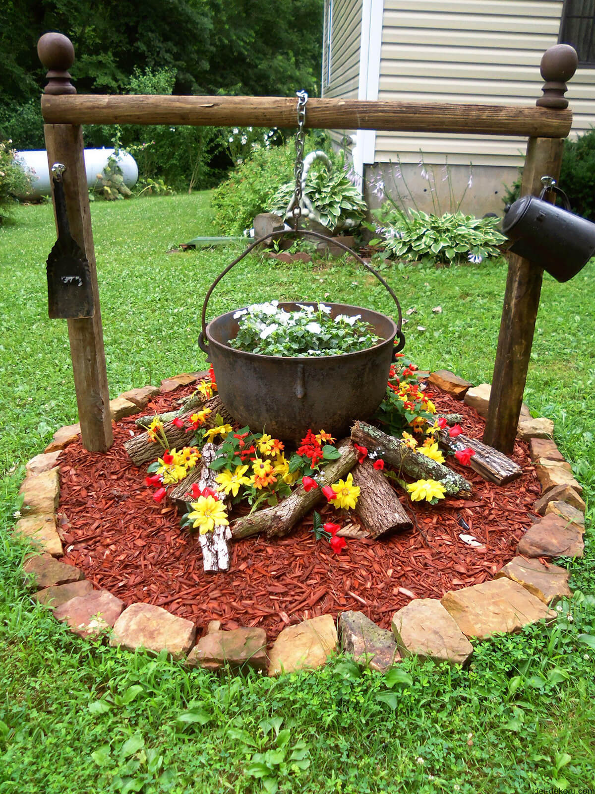 Antique Cauldron Flower Bed Design