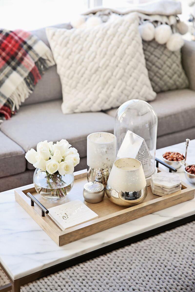 Glass and Gold Tray Display on a Marble-topped Table