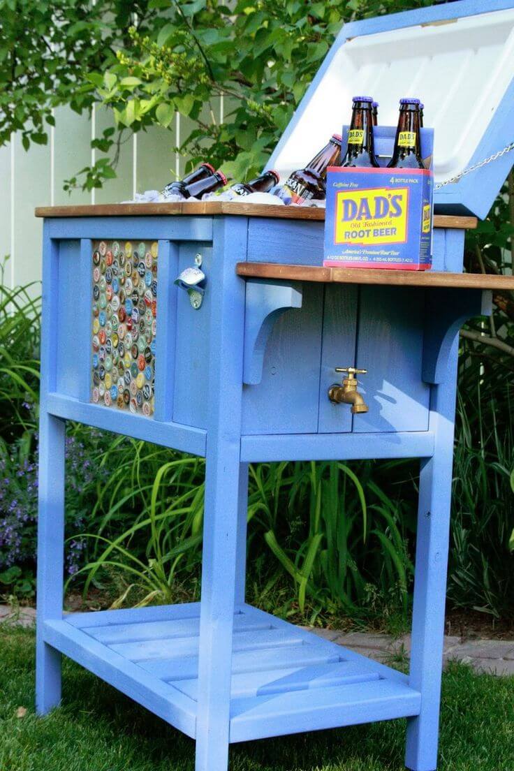 An Elevated Cooler Encased in Blue Wood