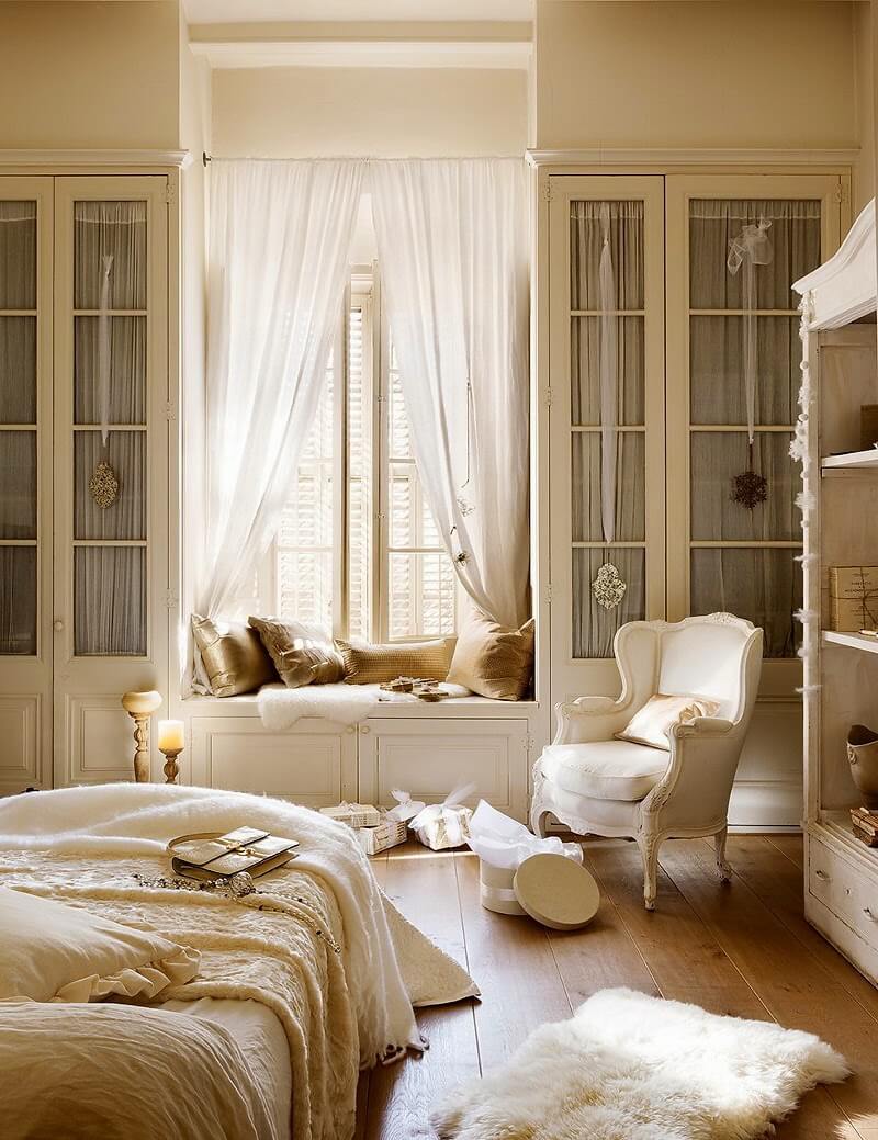 Romantic White Bedroom with a Window Seat