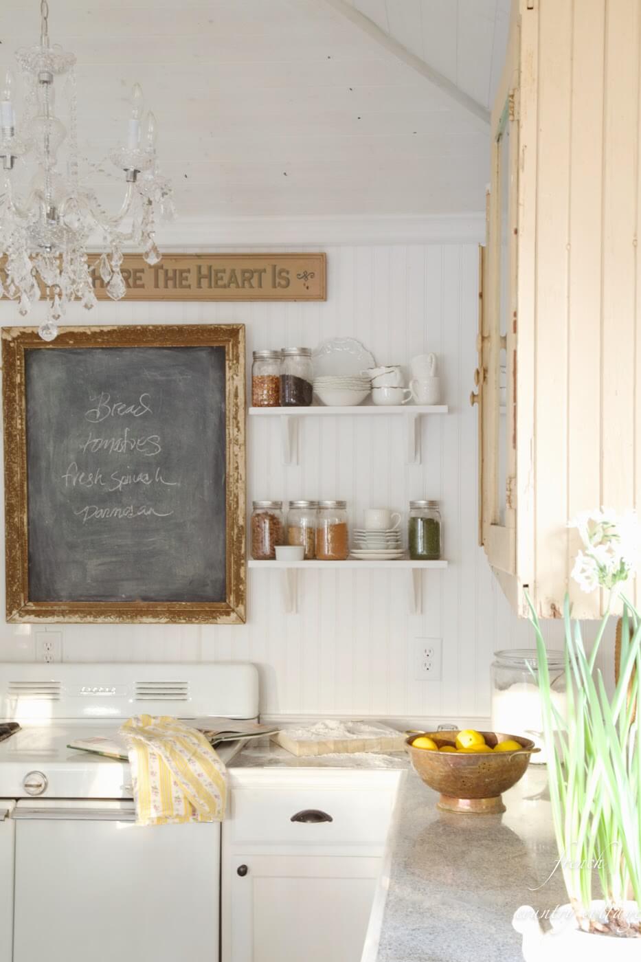 Eclectic French Kitchen with Rustic Chalkboard Sign