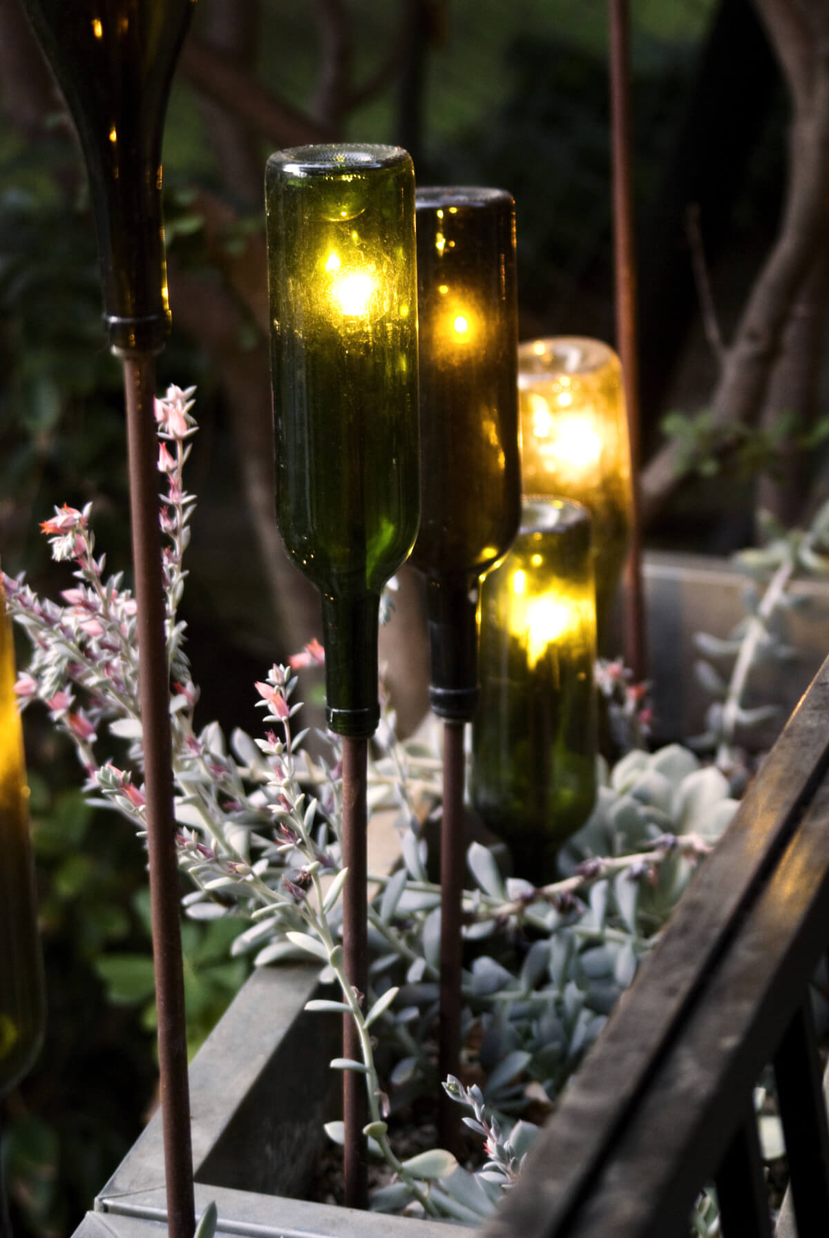 Green Glass Bottles Reborn as Gorgeous Torches