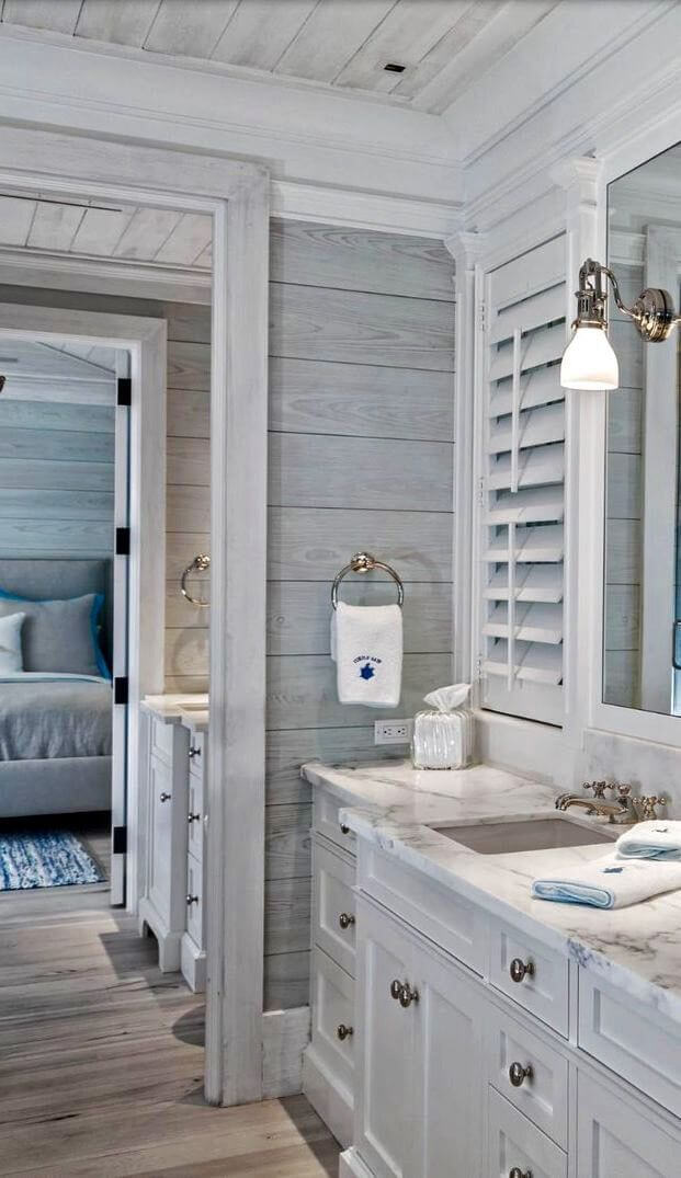 A Wood-Inspired Bathroom with Bronze Fixtures