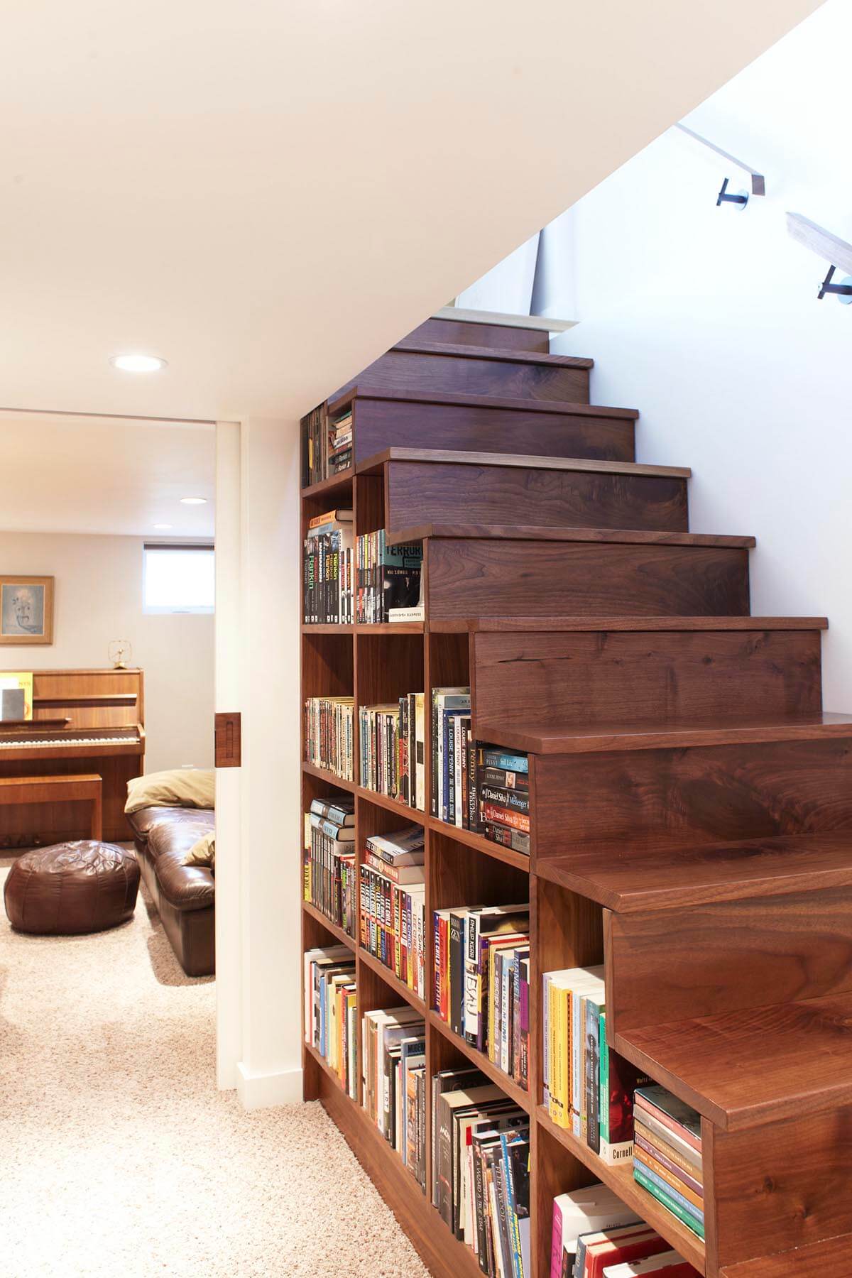 Custom Built-in Bookshelves Maximize Under-stair Space