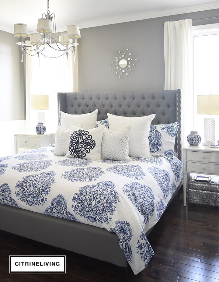 Bright, Cool Blue Patterns Add a Lush Touch to this Sleek Grey Bedframe
