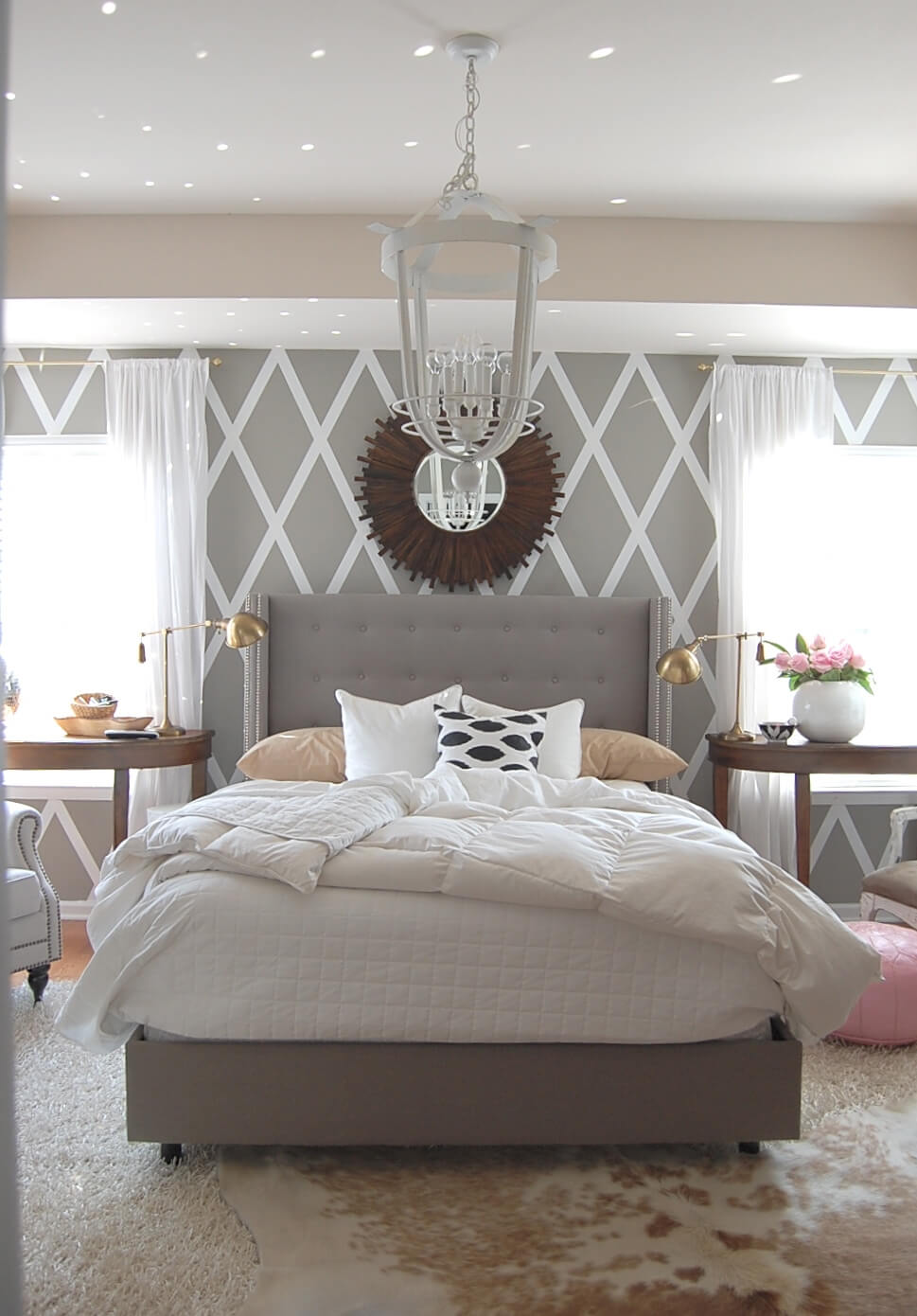 Geometric Patterns and Pastels Play Nicely in this Lush Grey Bedroom