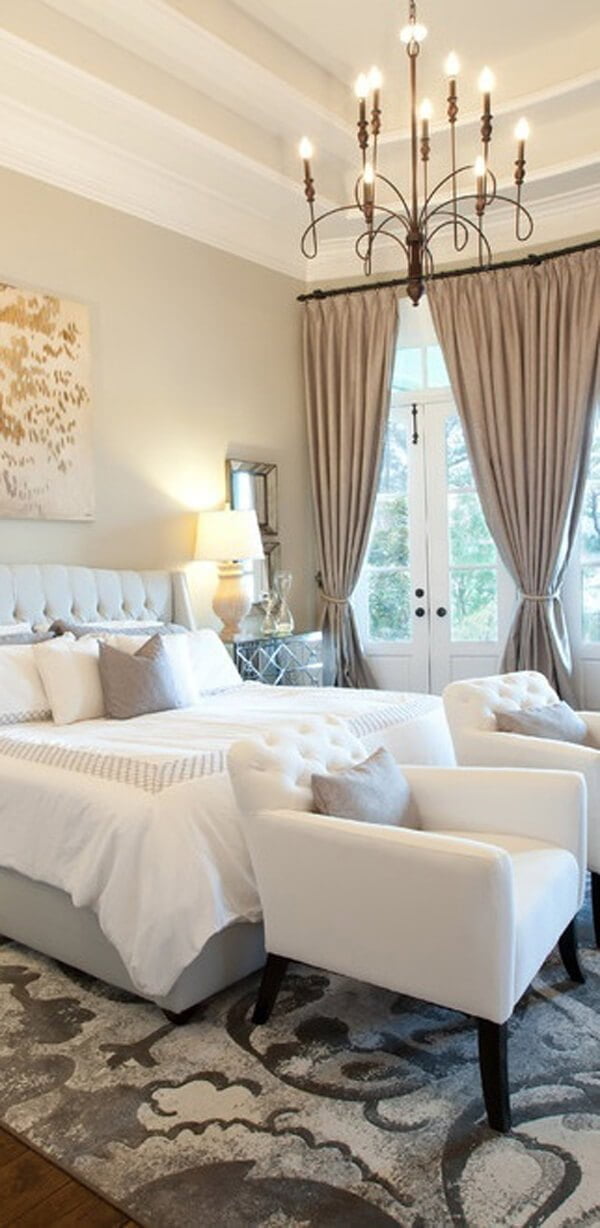 Grey Accents Ground this Sparkling White Bedroom Setting