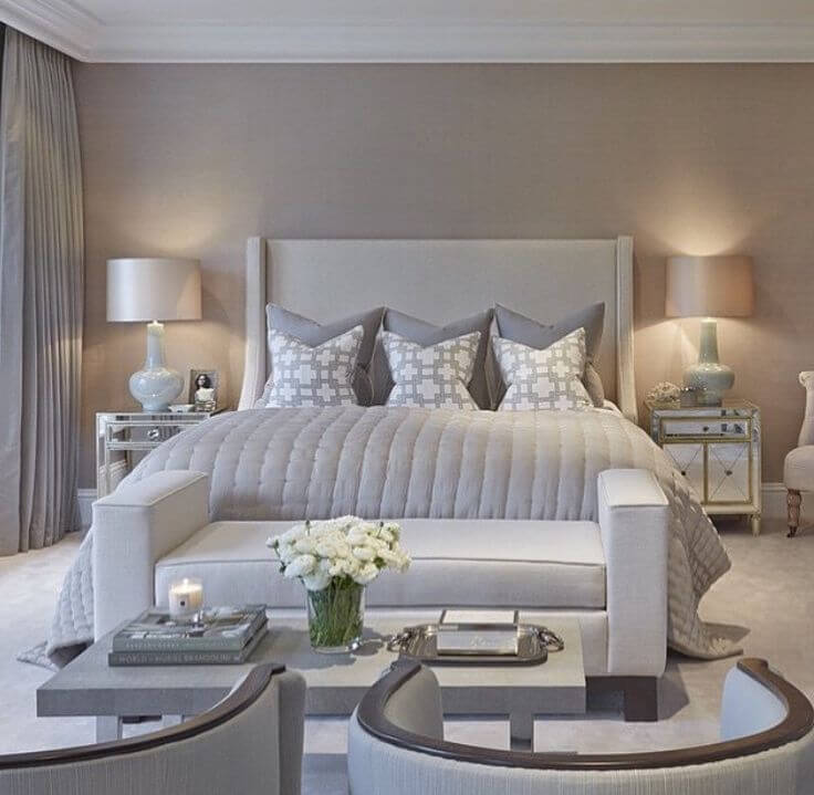 Warm Beige and Grey Neutrals Create an Inviting Atmosphere in this Bedroom