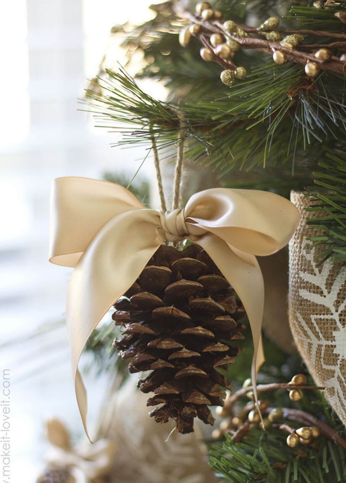 Natural Pinecone Hung With A Bow