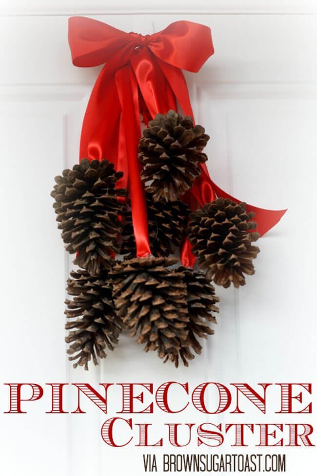 Bunch Of Pinecones Beribboned In Red