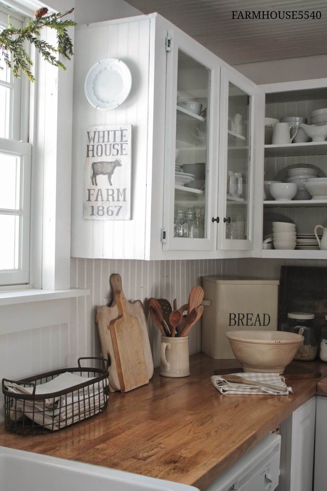 White Paneling Open-Face Farmhouse Cabinets