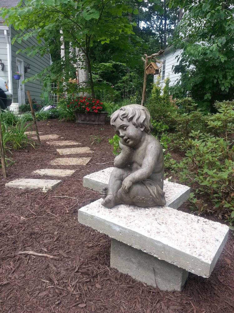 Elegant Concrete Bench and Child Sculpture