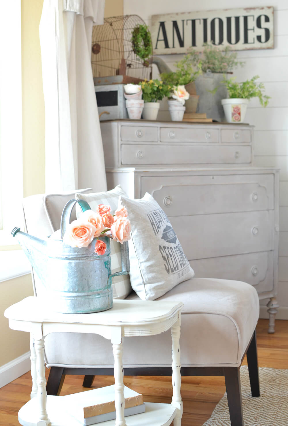 Metal Watering Can with Pink Flower Arrangements