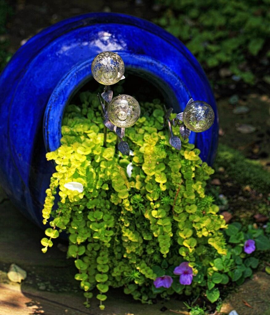 Greenery Accented with Glass Globes