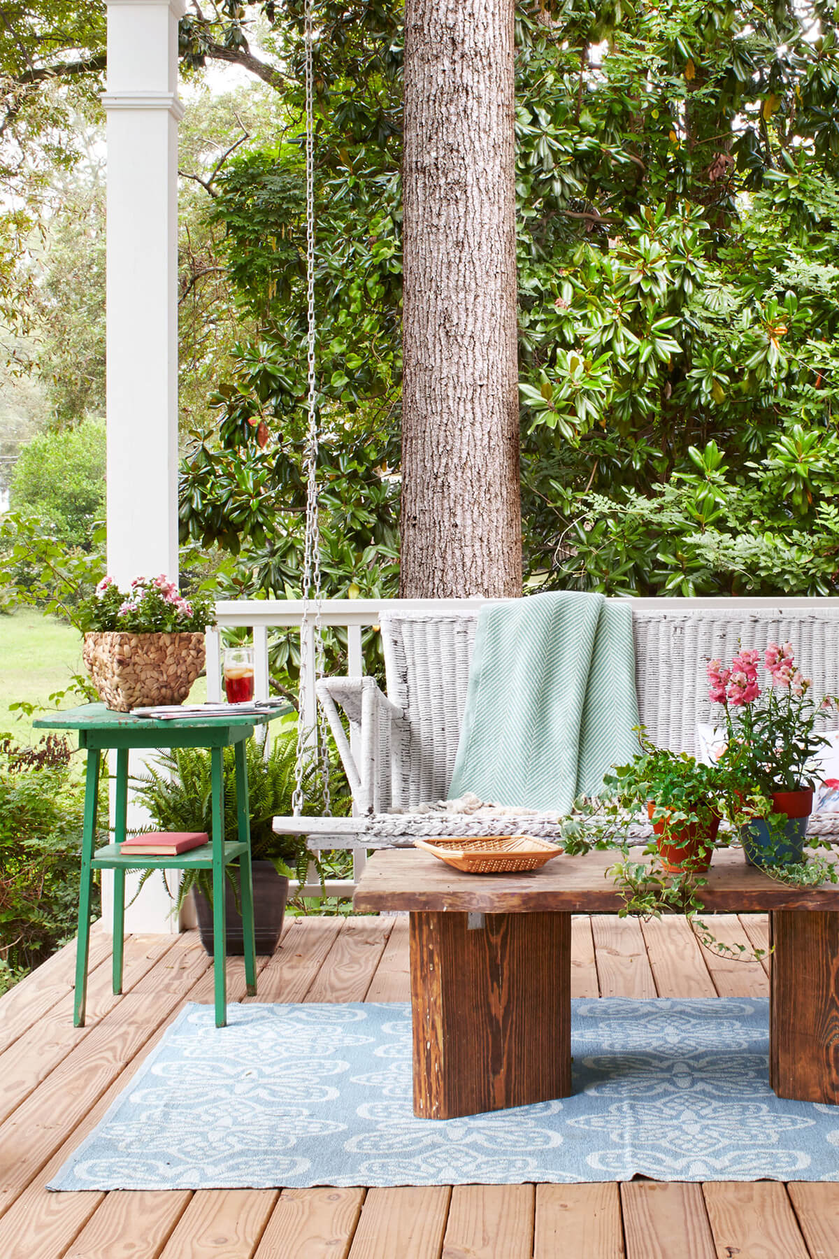 Outdoor Living Room With Wicker Porch Swing