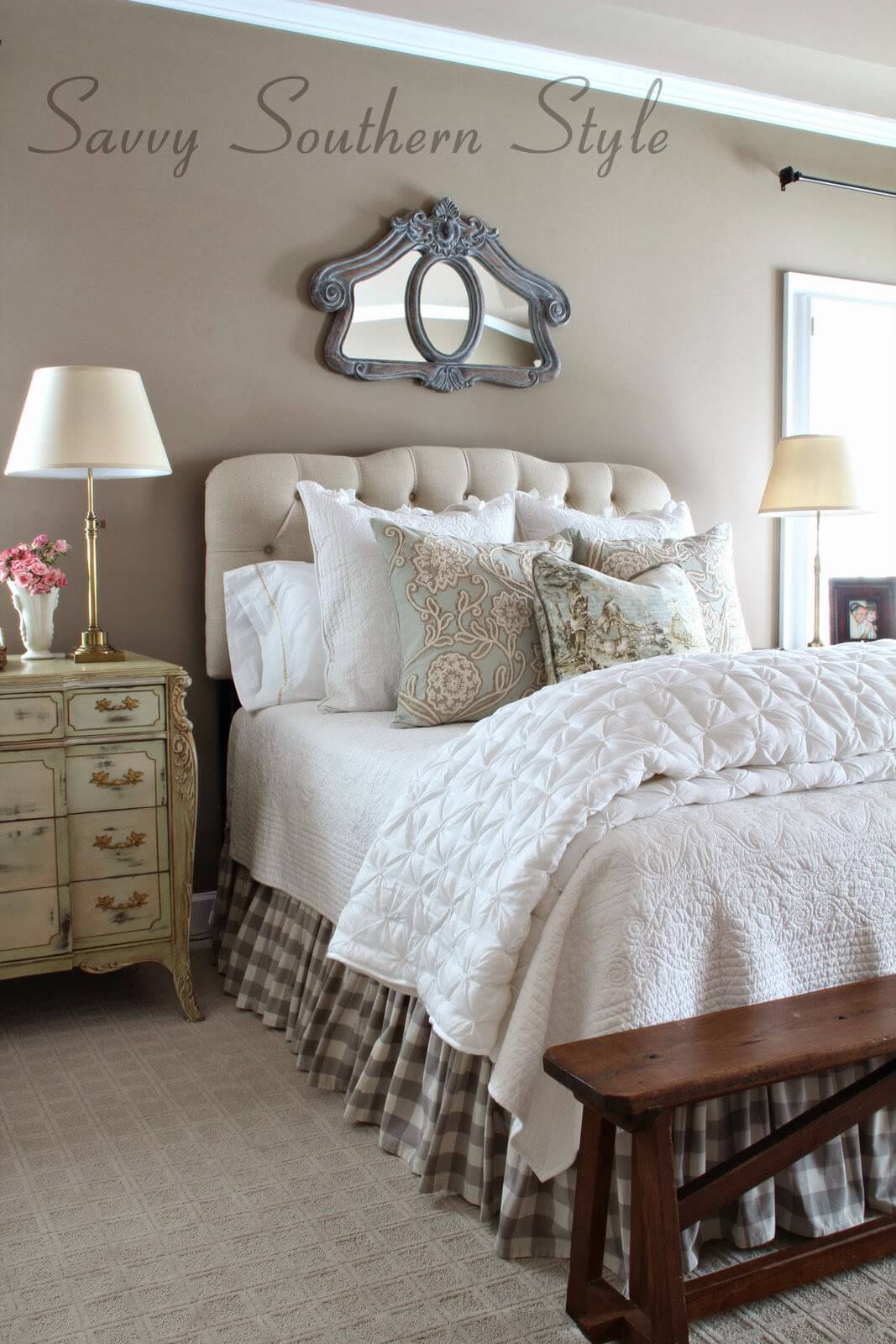 Tufted Headboard and Ornate Mirror