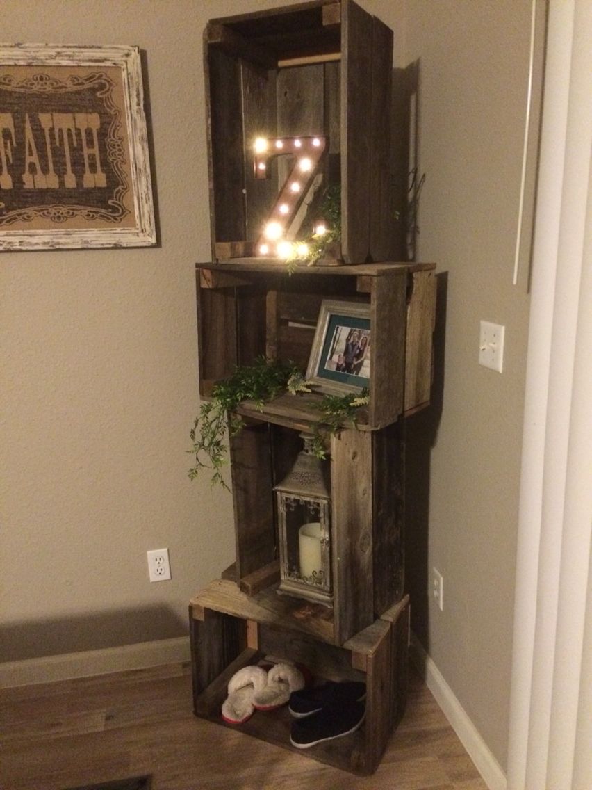 Stack of Old Wooden Crates with Initial Letters