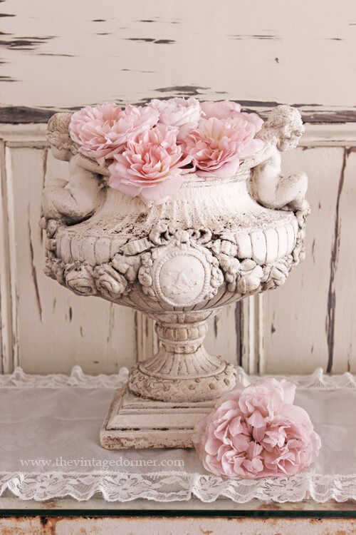 Old Pedestal Planter with Pink Blossoms