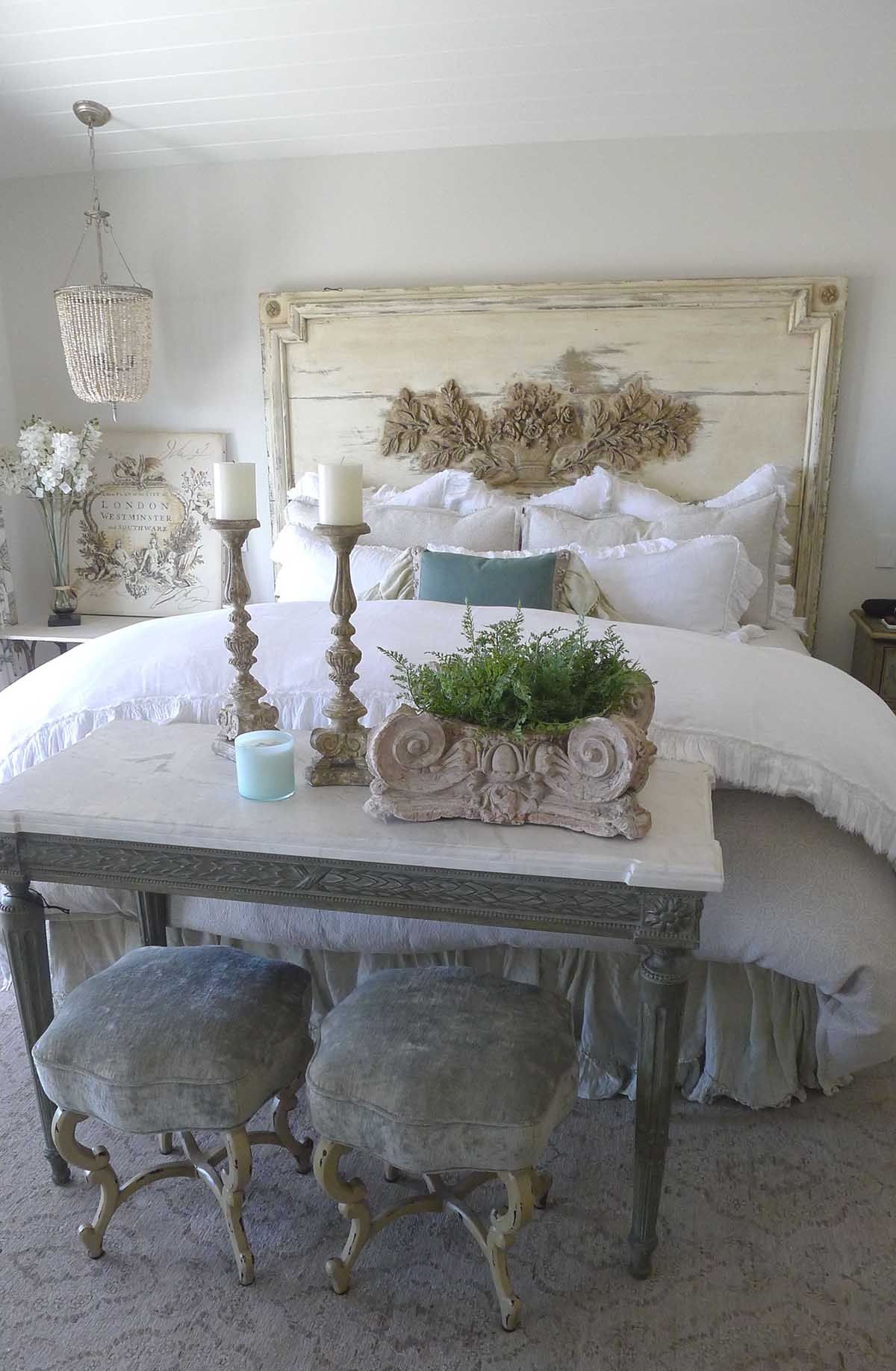 Ornamented Off-White Headboard with Luxurious Linens