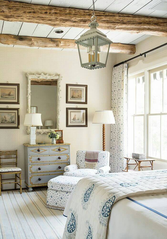 Delicate Blue and White Upholstery and Exposed Beams