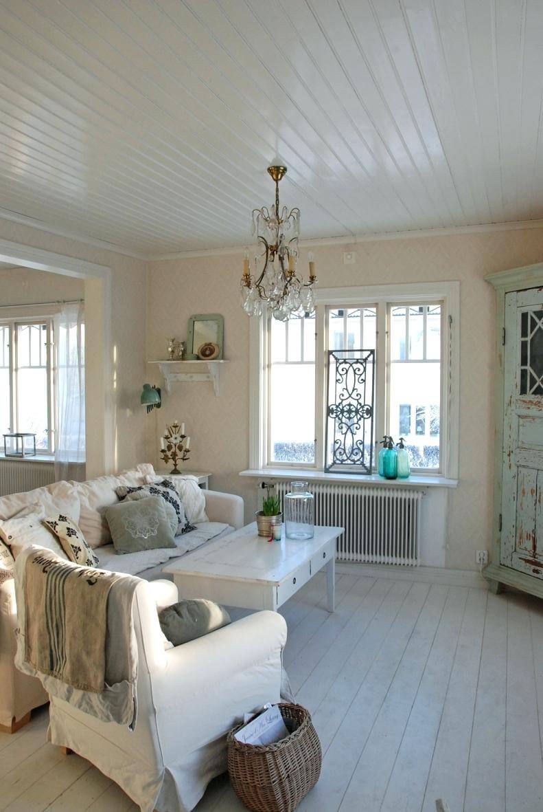 Calming Living Room with Pale Blue Cabinet