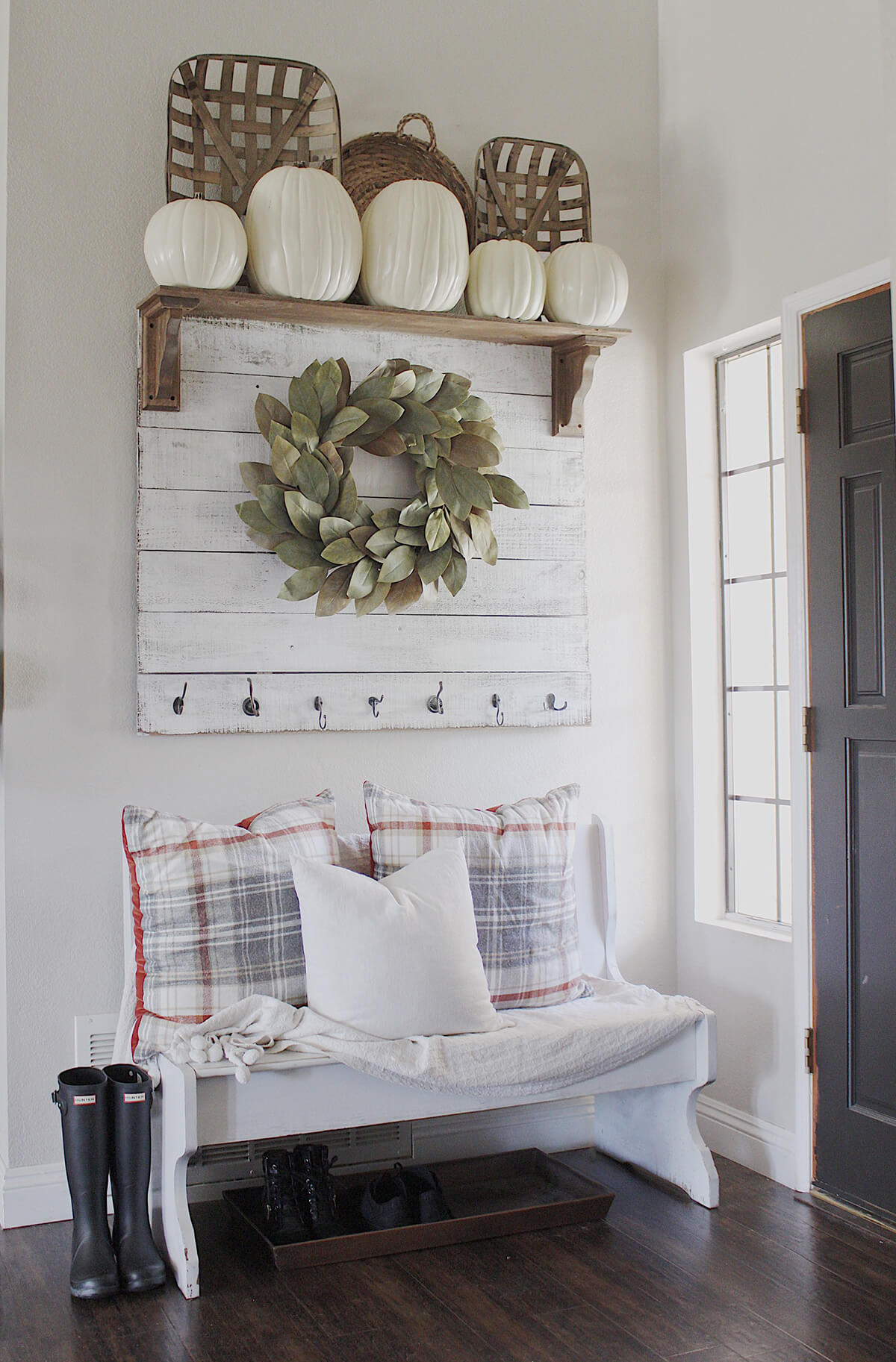 Mounted Wreath and Plaid Pillows in Pastels