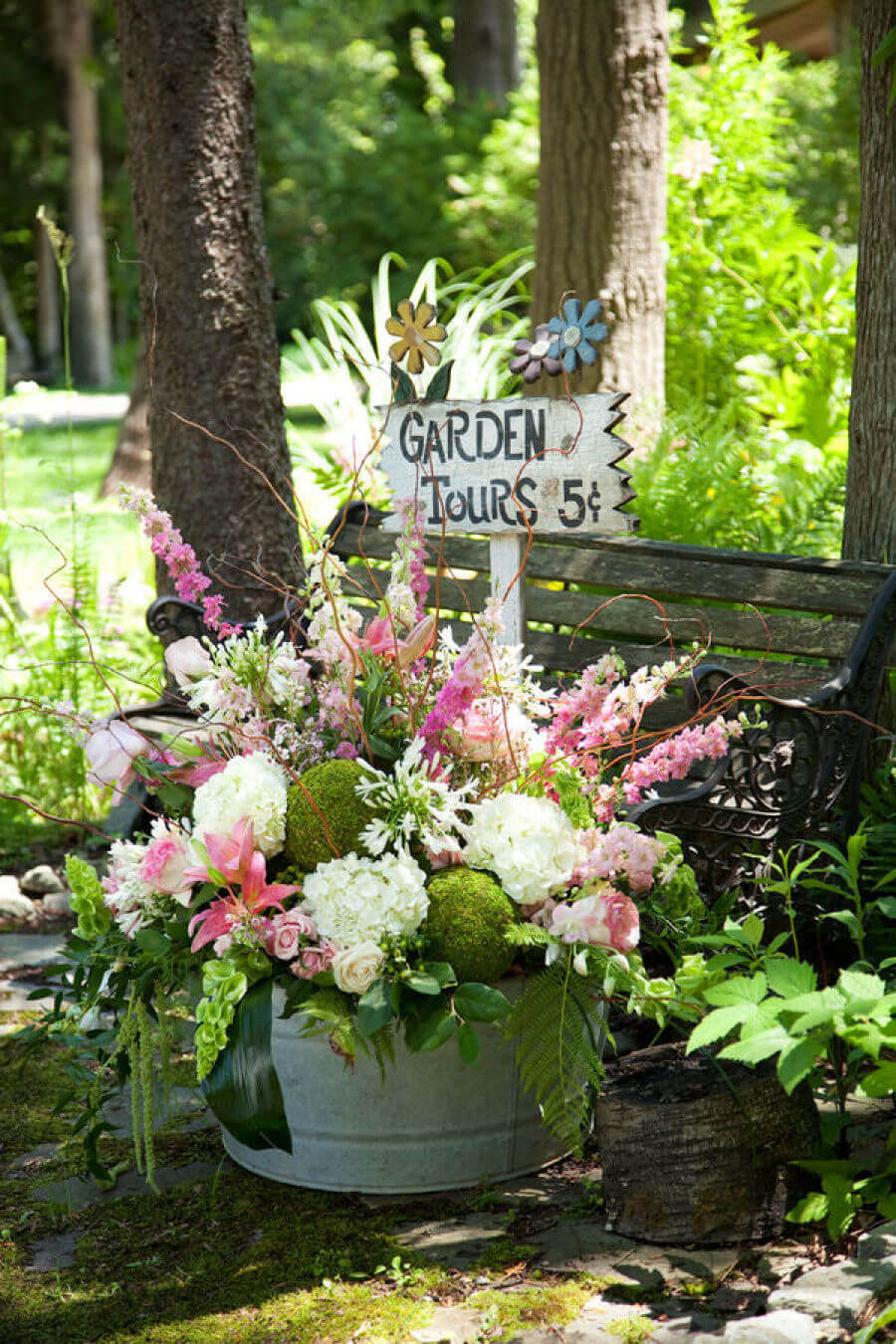 Garden Tours Sign in a Blooming Container