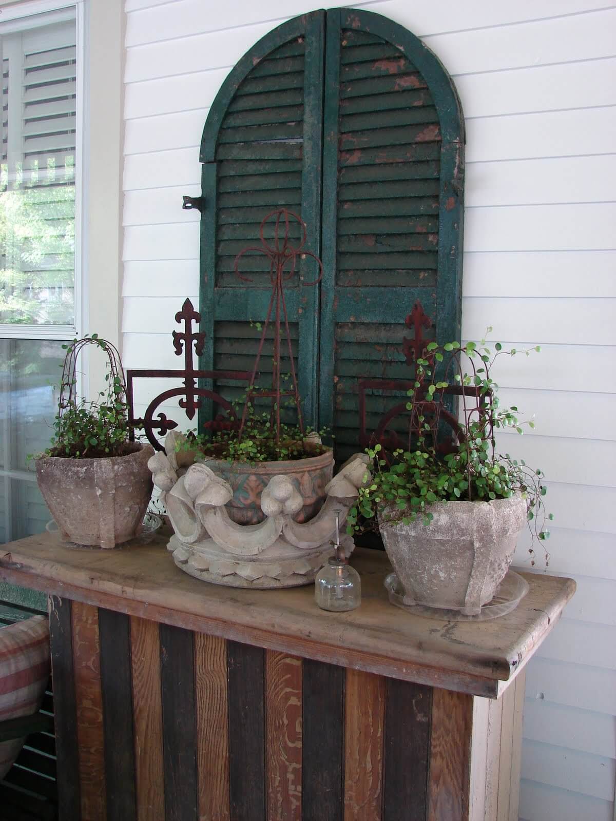 Green Backdrop for a Planter Arrangement