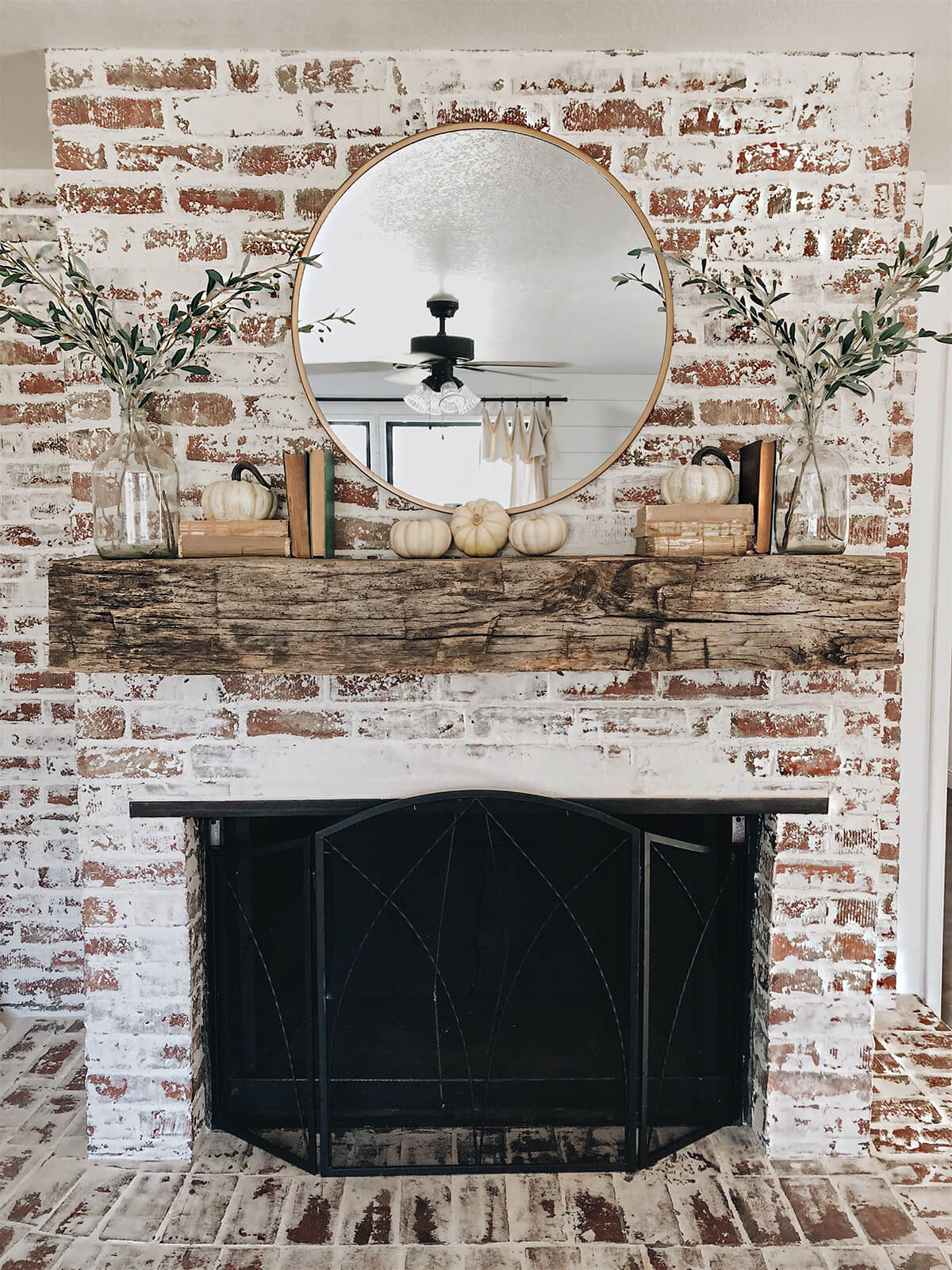 Simple Circular Mirror Reflecting the Living Room