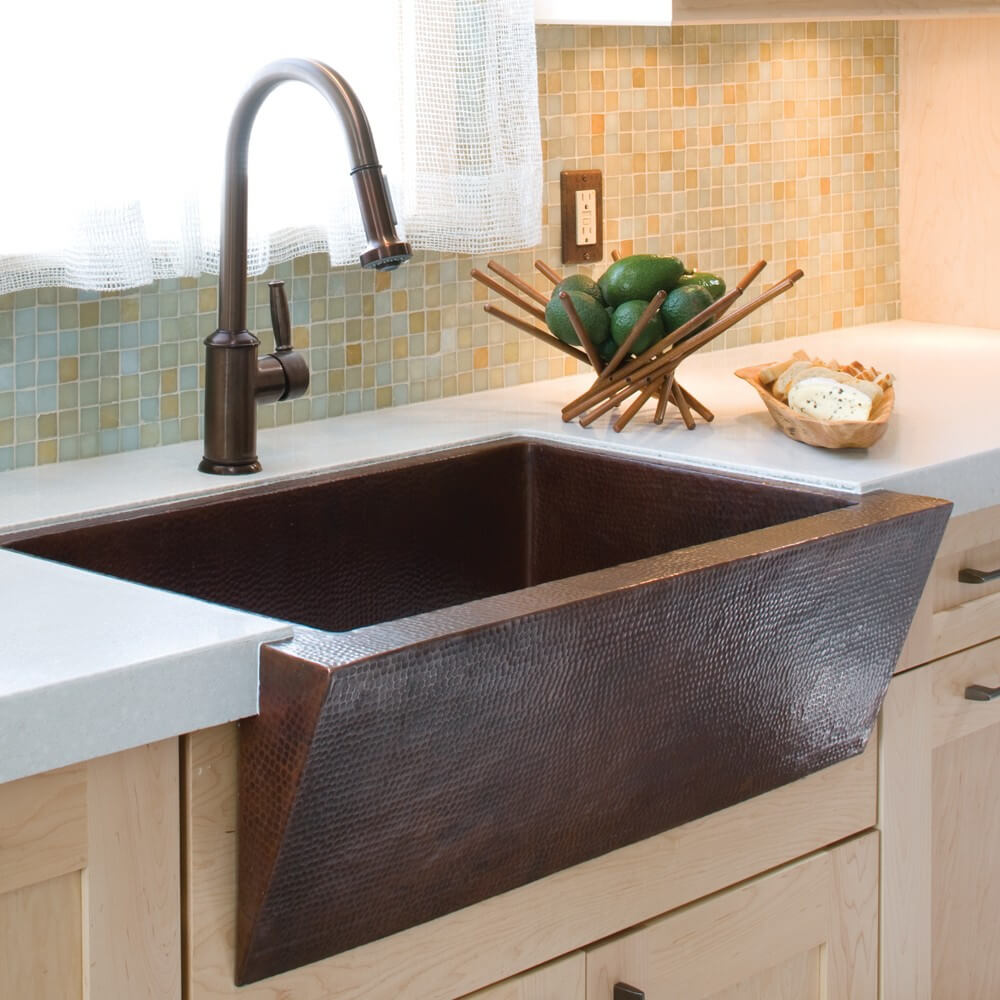 Gracefully Angled Hammered Kitchen Sink