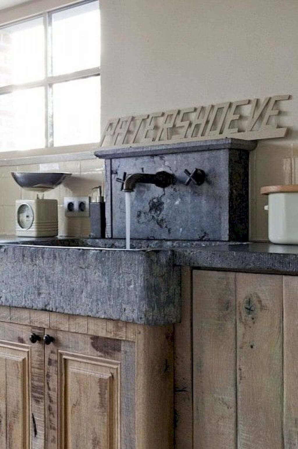 Vintage Stone Sink with Old Fashioned Fixtures