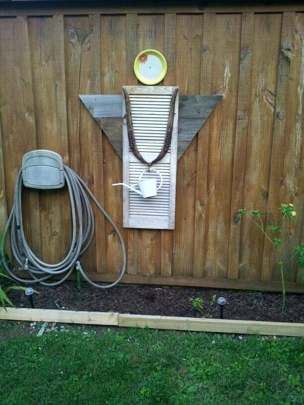 Watering Can Angel by the Hose Winder