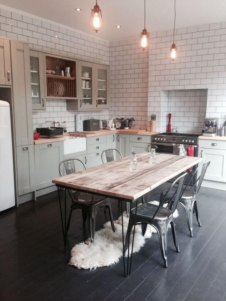 Contrast Between Industrial Table and Fluffy Rug