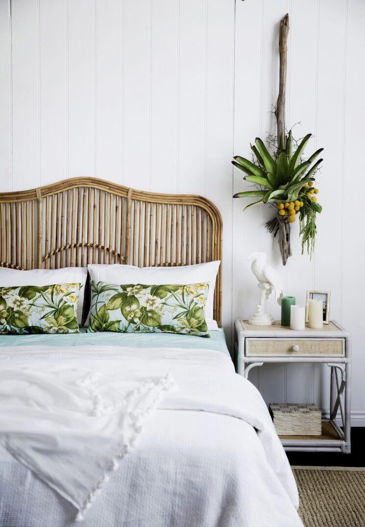 Relaxing Bedroom with Wicker Headboard and Plants