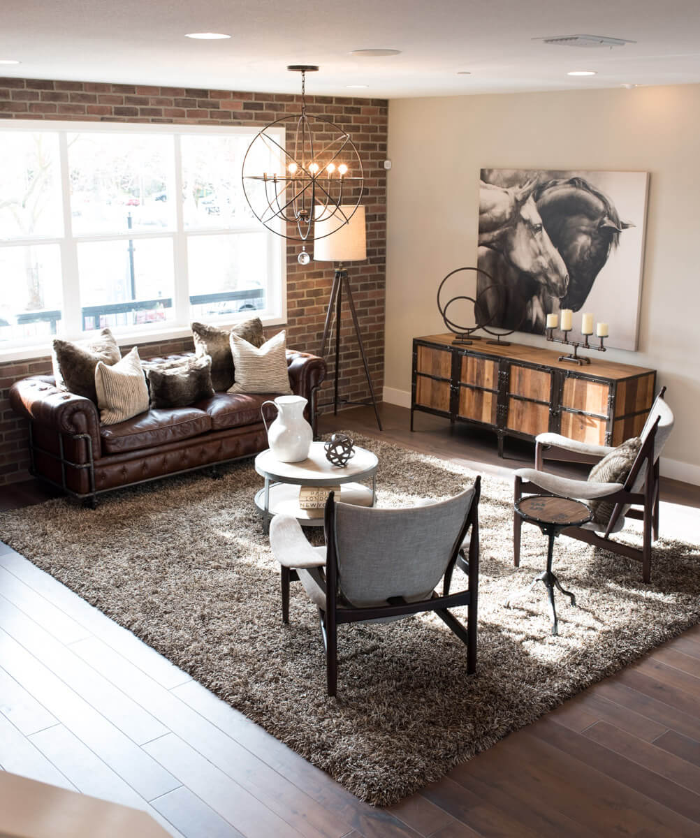 Exposed Brick, Open Metal Lights, and Leather