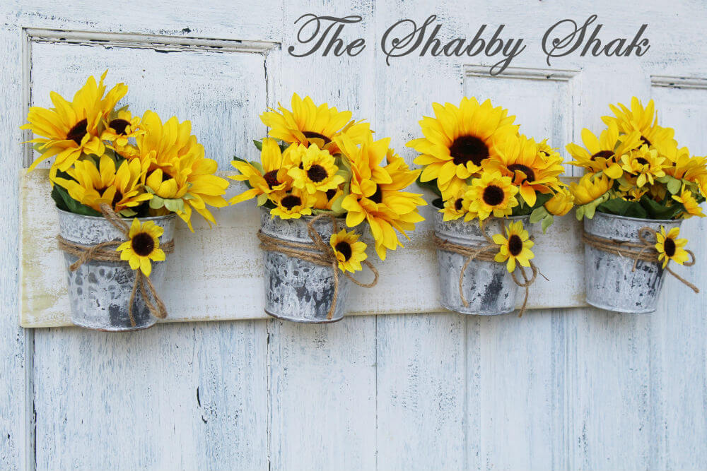 Sunflowers Adorn Distressed Wood and Galvanized Buckets