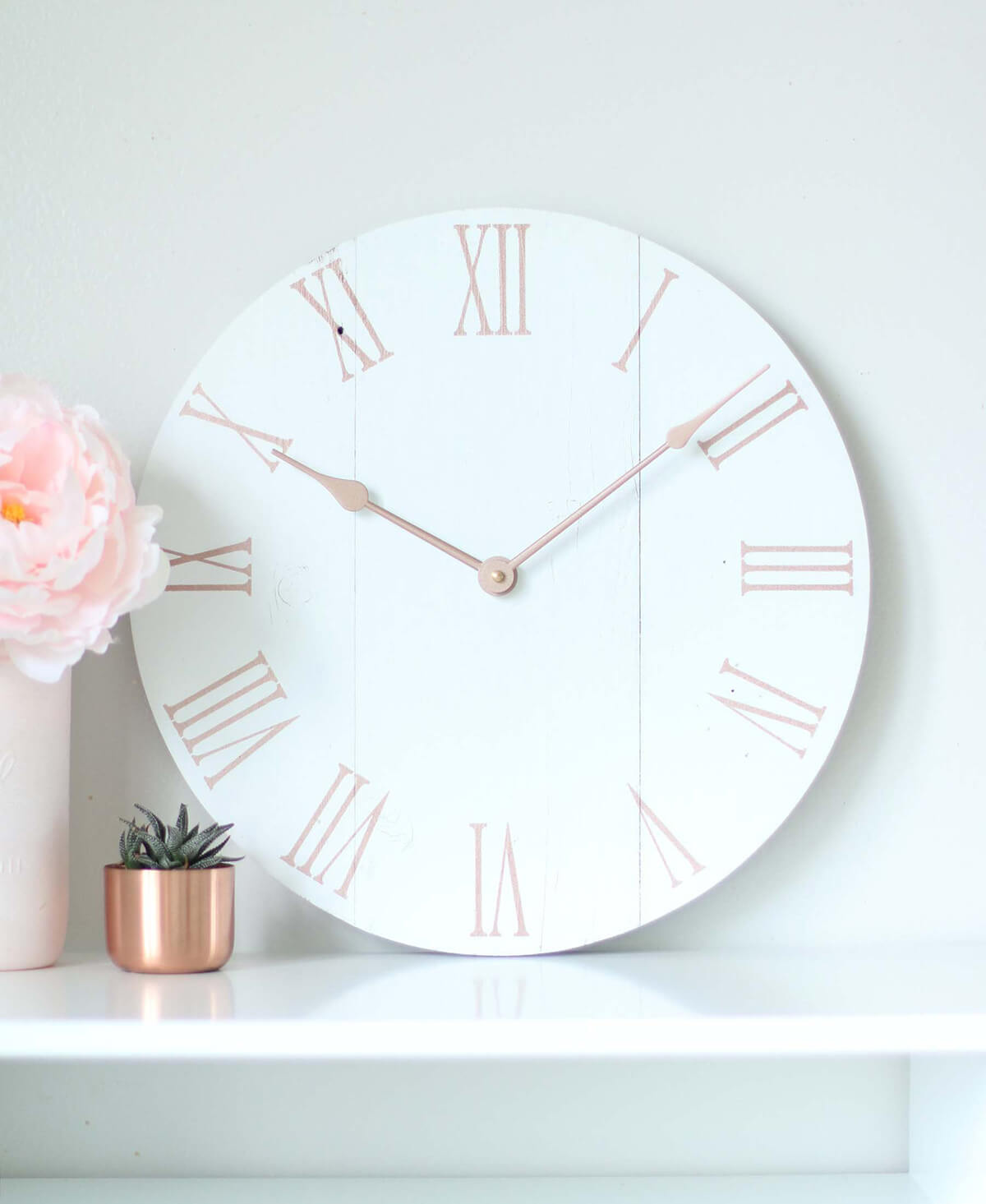 Serene Rose Quartz Clock Above the Fireplace