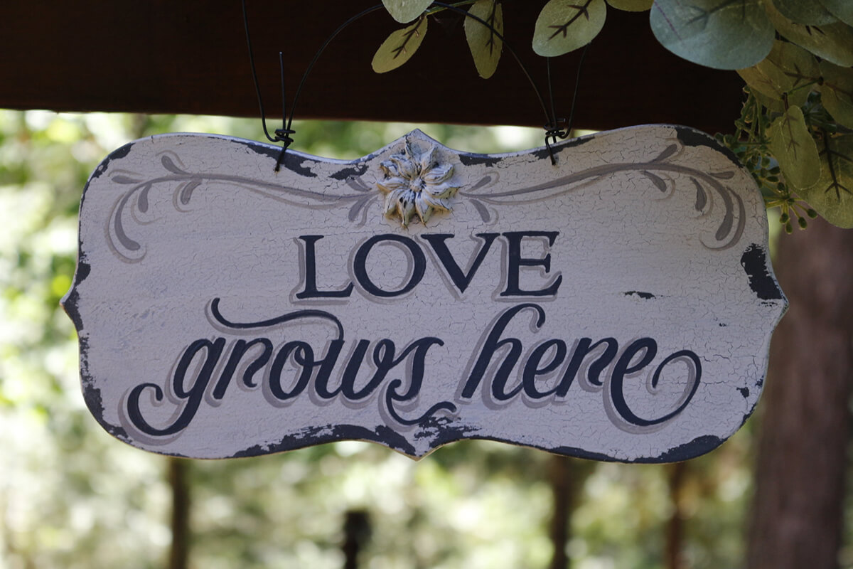 "Love Grows Here" Garden Sign