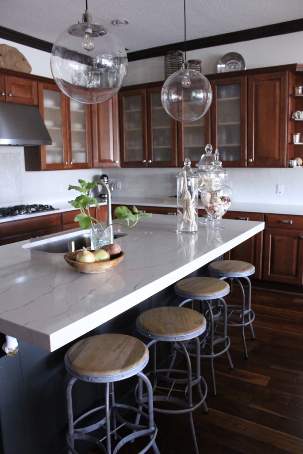 A Coastal Kitchen With Brown Wood Cupboards