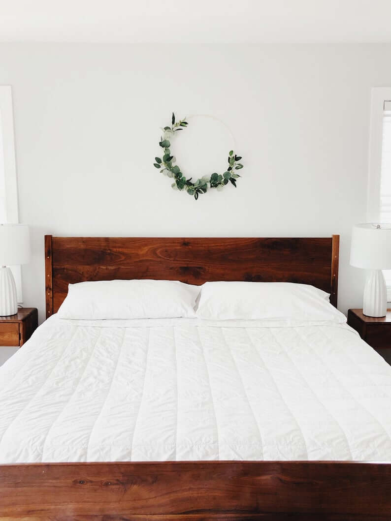 Beautiful Simplicity - Dark Wood Bed and Wreath