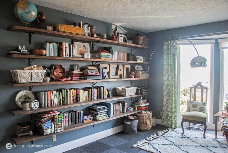 Simple Walnut Wall-Length Library Shelves - These simple wall-length bookshelves are perfect for a clean simple look without sacrificing function.